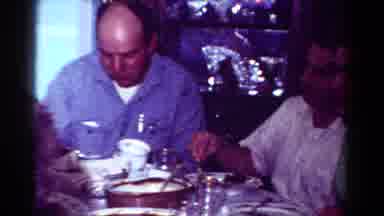 Toledo Ohio USA (1954): I See A Few People Sitting At A Table Eating And Laughing