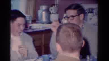 Toledo Ohio USA (1954): Family Sits Together Around The Table To Talk And Eat