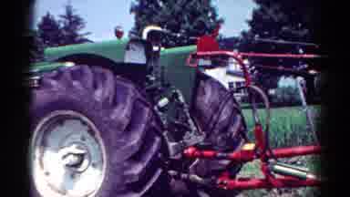 Toledo Ohio USA (1954): Classic Green Tractor During A Days Work In The Field