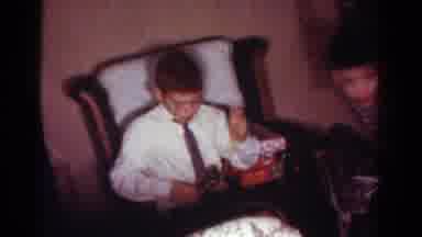 Toledo Ohio USA-1954: Family Happily Exchanging And Opening Presents In Vintage