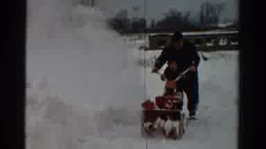 Toledo Ohio USA (1954): Man Removes The Excess Snow Accumulated In Front Of His