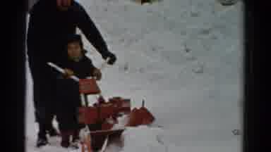 Toledo Ohio USA (1954): Little Boy Helping His Dad Push A Snow Blower To Clear A
