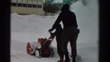 Toledo Ohio USA (1954): Adult And Child Pushing A Snow Blower In The Winter To