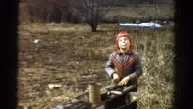 Toledo Ohio USA (1954): Young Boy Playing Outside And Digging In The Ground For