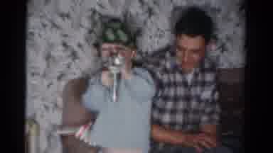 Toledo Ohio USA (1954): Boy In Army Helmet Shows New Toy Gun With Smiling Father