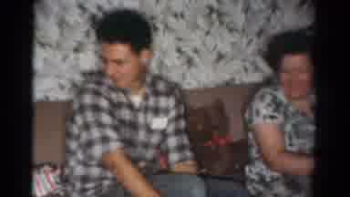 Toledo Ohio USA (1954): Man In Black And White Checked Shirt Next To Woman On