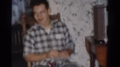 Toledo Ohio USA (1954): A Guy Is Sitting On The Side Of A Radio Table And Talking