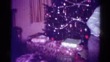 Toledo Ohio USA (1954): Christmas Tree With Presents Underneath Boy Rocking Back