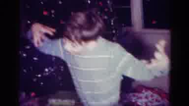 Toledo Ohio USA (1954): Child Playing At House Near A Christmas Tree With A Parent