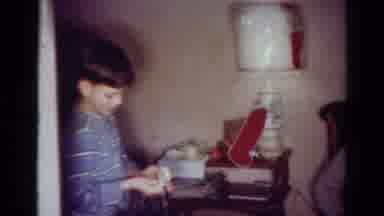 Toledo Ohio USA (1954): A Young Male Trying On A Watch And Seems Satisfied