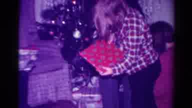 Toledo Ohio USA (1954): Family Celebrating Christmas Passing Presents Out Around