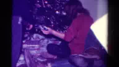 Toledo Ohio USA (1954): Big Sister Hands Out Presents From Under The Christmas