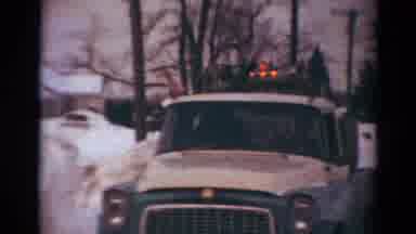 Toledo Ohio USA (1954): Car Driving Past A Snowplow On The Street On A Very Snowy