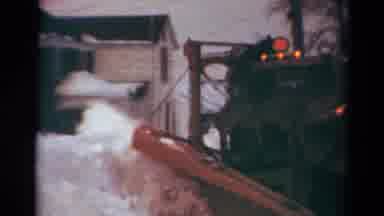 Toledo Ohio USA (1954): Large Red Plow Piles Up The Snow As It Clears The Roads In