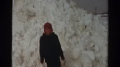 Toledo Ohio USA (1954): Person Wearing Red Hat Stands In Front Of Huge Snow Drift