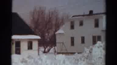 Toledo Ohio USA (1954): Snowbanks Next To White Buildings On A Clear Winter Day