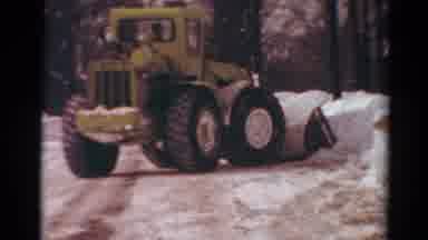 Toledo Ohio USA (1954): A Tractor Moves In Thick Snow The Driver Is Very Hard