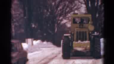 Toledo Ohio USA (1954): A Large Vehicle Is Working On Getting Rid Of Ice Blocks On
