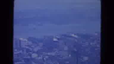 New York City (1954): Aerial View Of City And River On A Cloudy Day