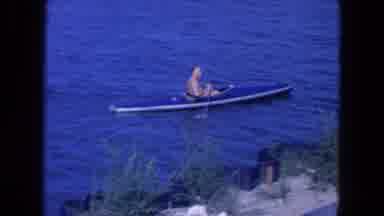 New York City (1954): Boats Rowing Water City Breeze Shirtless Soaking Sun Man