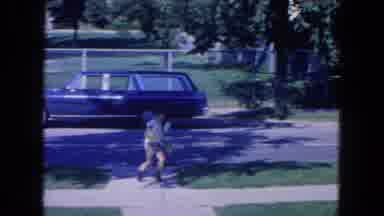 New York City (1954): Two Young Boys Outside Playing With One Running Down The