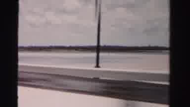 Dade County Florida (1955): Traveling Across Bridge Over Beach And Water With A