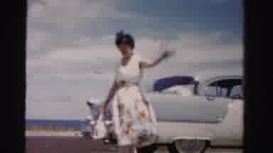 Dade County Florida (1955): A Lady Walking Along The Beach On A Beautiful Summer