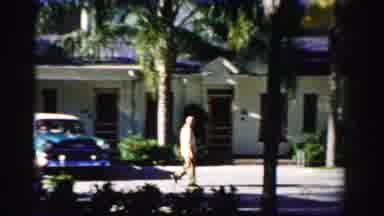 Dade County Florida (1955): Man Walking Along Tropical Neighborhood