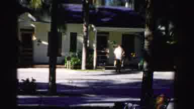 Dade County Florida (1955): The Person Doing Walking In Front Of The House In