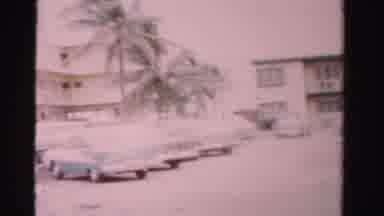 Dade County Florida (1955): A Man Is Standing Near The Hotel And Cars Were Parked