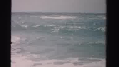 Dade County Florida (1955): Medium Sized Waves Of The Ocean Coming To Shore On A