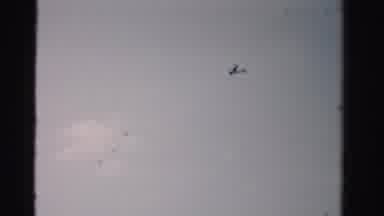Dade County Florida (1955): Pilot Flying A Small Single Engine Airplane On A Clear