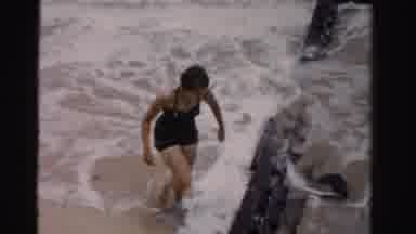 Dade County Florida (1955): Woman In Swimsuit Walking Out Of Ocean Then Walking