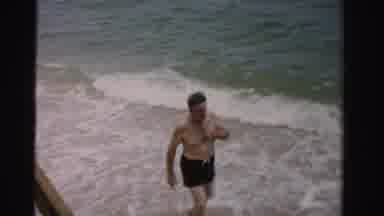 Dade County Florida (1955): People Standing By The Water At A Beach Taking In The