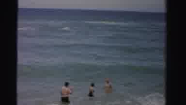 Dade County Florida (1955): Three People Swimming In The Clear Waters Of The Ocean