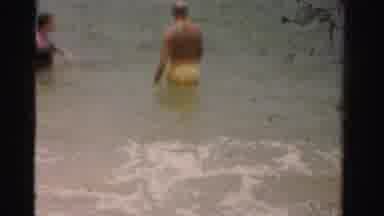 Dade County Florida (1955): One Older Bald Man Two Older Women At The Beach