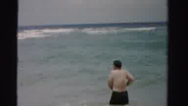 Dade County Florida (1955): Men Wading In Deep Sea Surf On A Bright Sunny Day