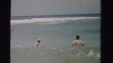 Dade County Florida (1955): Two Men Entering The Sea On Typical Summer Day On