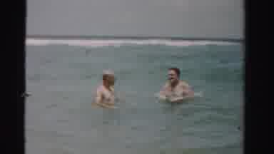Dade County Florida (1955): Two Men Swimming Around In The Ocean And Having Some