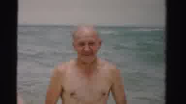 Dade County Florida (1955): People At The Beach Swimming In Wavy Water And Walking