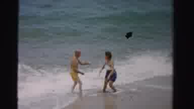 Dade County Florida (1955): A Romantic Couple Play Fighting By The Wide Ocean