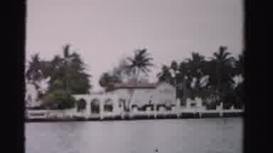Dade County Florida (1955): Moving View Of A Small Coast Across The Water With