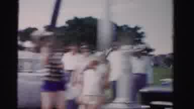 Dade County Florida (1955): Driving Past Vintage Cars People With Grass Trees And