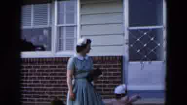 Hicksville New York (1955): Child Runs Down The Sidewalk Over His Mother's