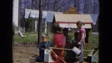Hicksville New York (1955): A Group Of Young Children Play Together Around A