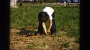 Hicksville New York (1955): A Little Girl Uses Shovel To Scoop Muddy Dirt In A Not