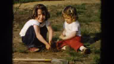 Hicksville New York (1955): Two Girls Dig In Dirt With Garden Tool On A Clear