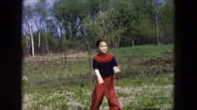 Hicksville New York (1955): Boy Wearing Red Pants Runs Away From Girl Wearing