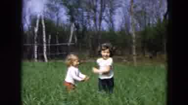 Hicksville New York (1955): Children Play Tag Together In A Field Of Tall Grass