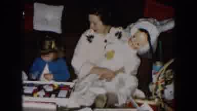 Hicksville New York (1955): Family Playing With Doll During Holidays